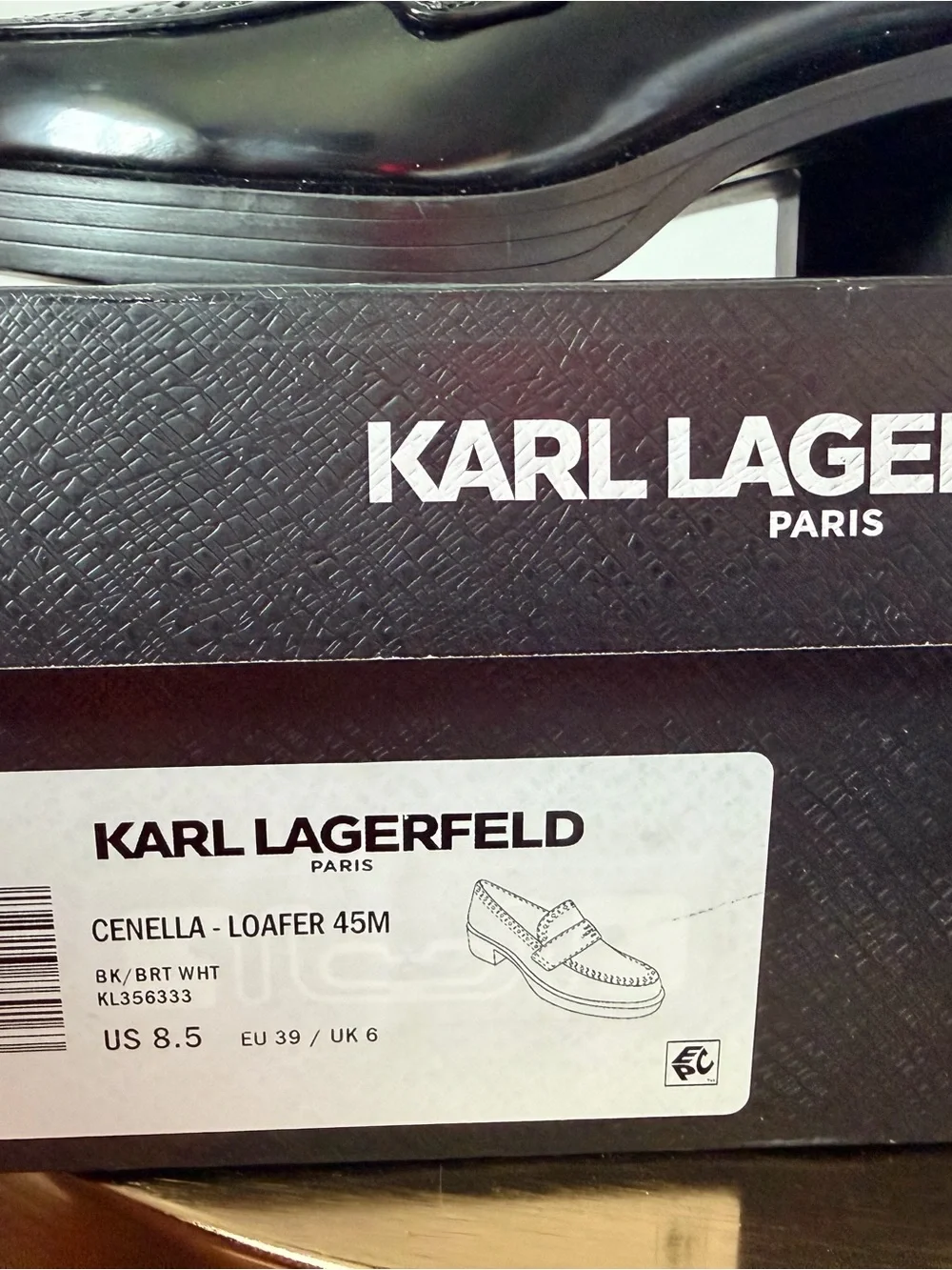 Karl Lagerfeld perforations wear